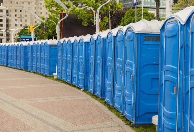 a row of portable restrooms at a fairground, offering visitors a clean and hassle-free experience in ingleside